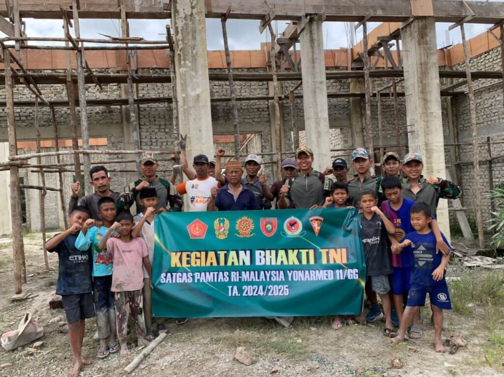 Semangat Kebersamaan Satgas Pamtas Yonarmed 11 Kostrad Bersama Warga Bangun Masjid Al-Nurul